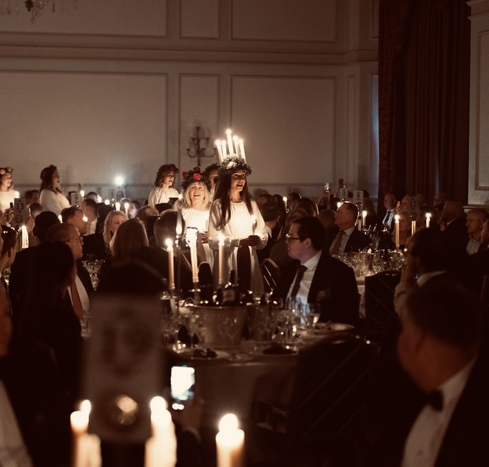 Candlelit Lucia performance at a Swedish Chamber of Commerce dinner